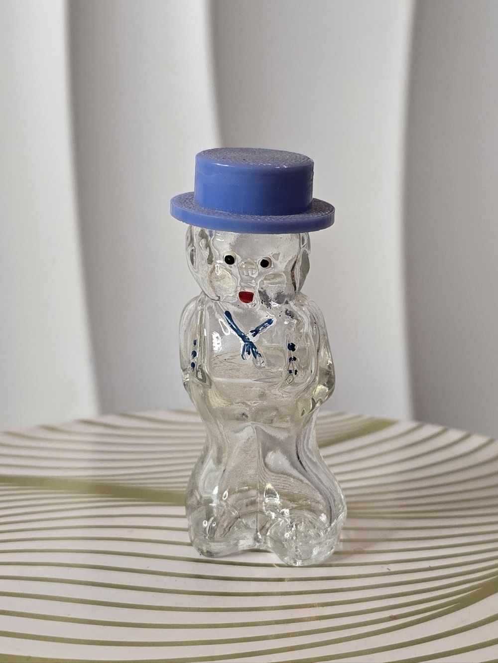 Novelty glass perfume bottle in the shape of a man 1940s